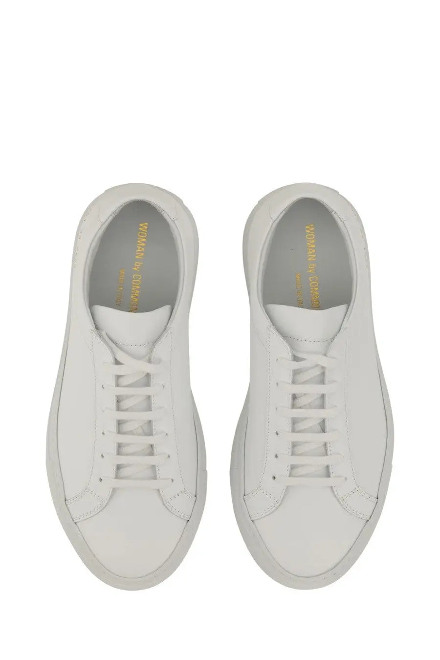 Common Projects women’s low original Achilles white leather low-top sneakers with minimalist design and gold branding inside heel