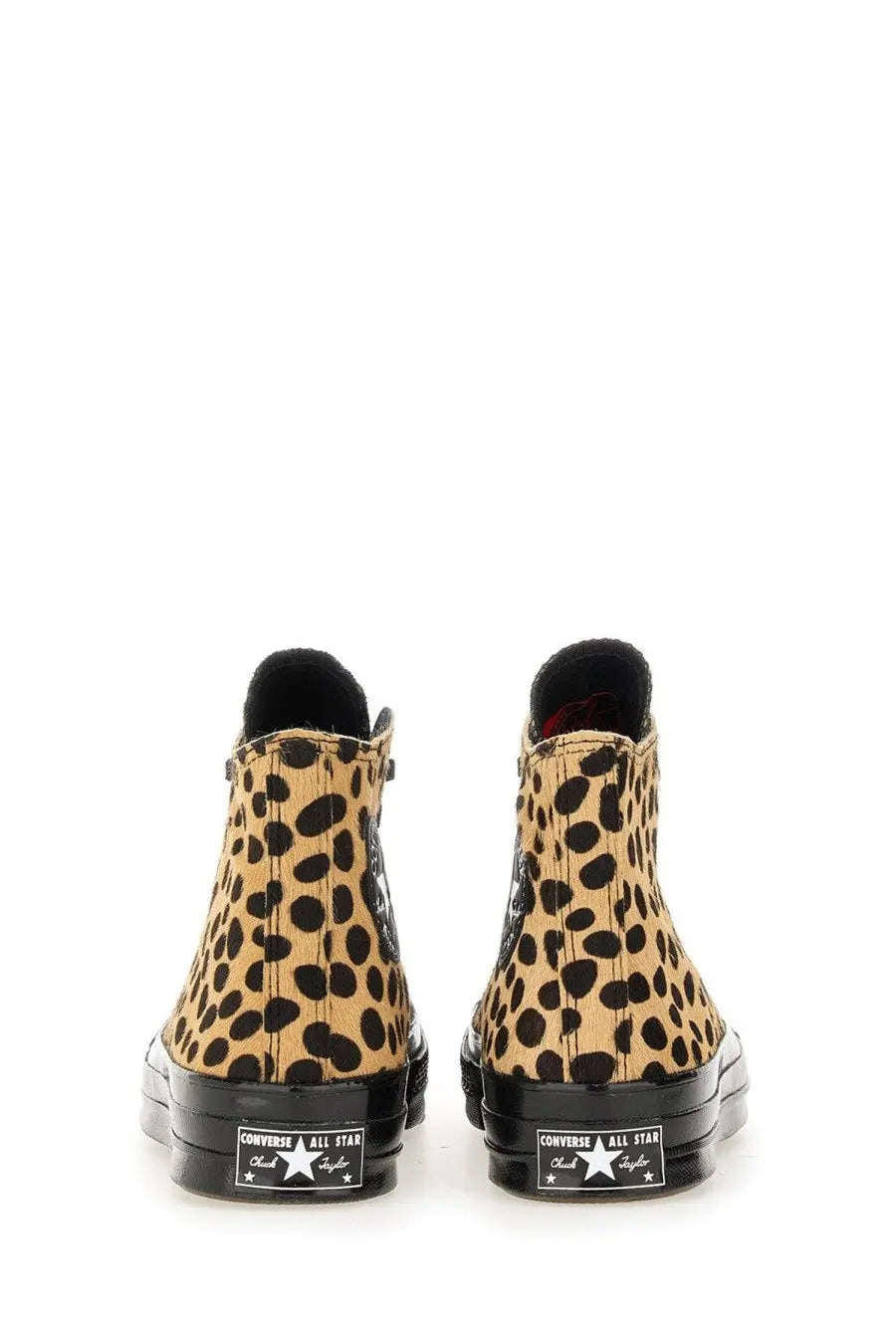 Converse unisex chuck hi sneaker featuring leopard-print canvas with black rubber soles and classic star logo branding