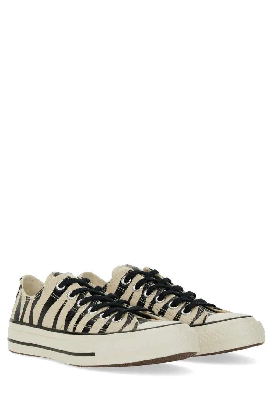 Beige and black zebra-striped canvas Converse unisex Chuck OX sneaker with chunky white rubber sole