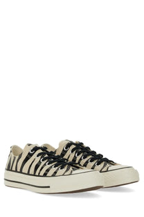 Beige and black zebra-striped canvas Converse unisex Chuck OX sneaker with chunky white rubber sole