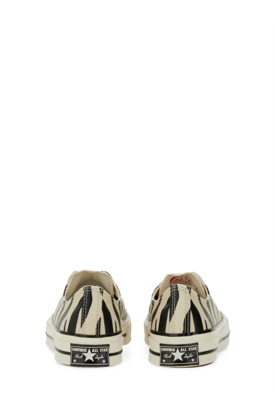Converse unisex chuck ox sneaker low-top in black and cream zebra stripe design with canvas material