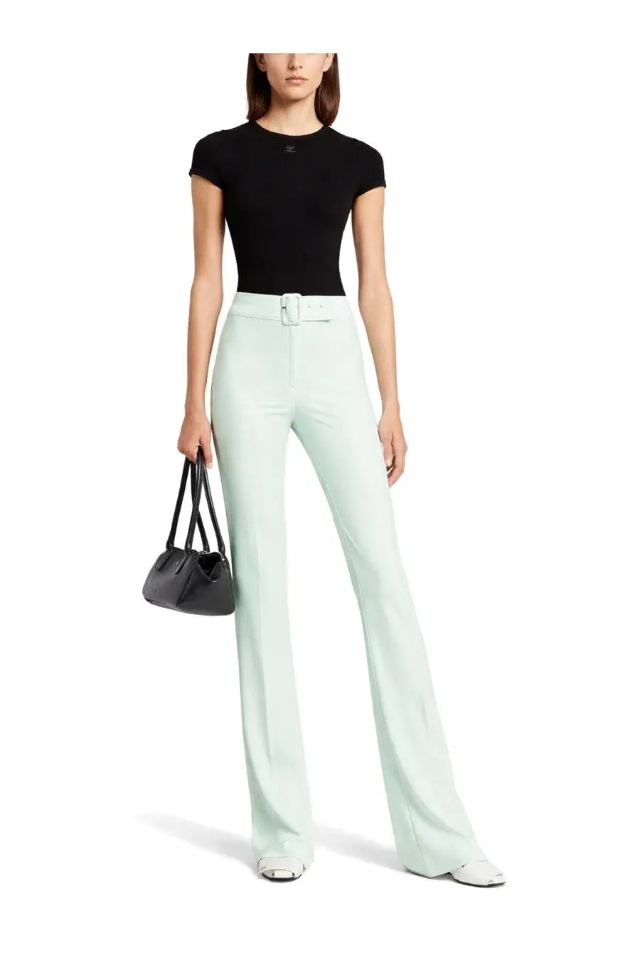 Mint green high-waisted flared trousers with white belt buckle styled with courrèges women’s baby spongy shirt black