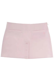 Courrèges women’s miniskirt in soft pink with two front pockets and central button closure in minimalist style