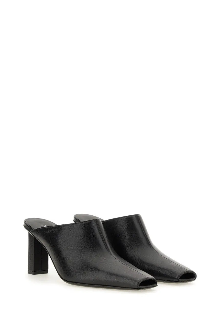 Courrèges women’s sleek black leather mules with square toe and block heel shown from the back side