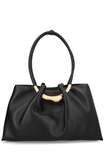 Cult Gaia women’s black leather tote bag with a distinctive gold-tone circular handle accent