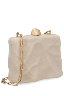 Cream-colored Cult Gaia womens clutch with textured sculpted body and gold-tone chain strap in white flyn design