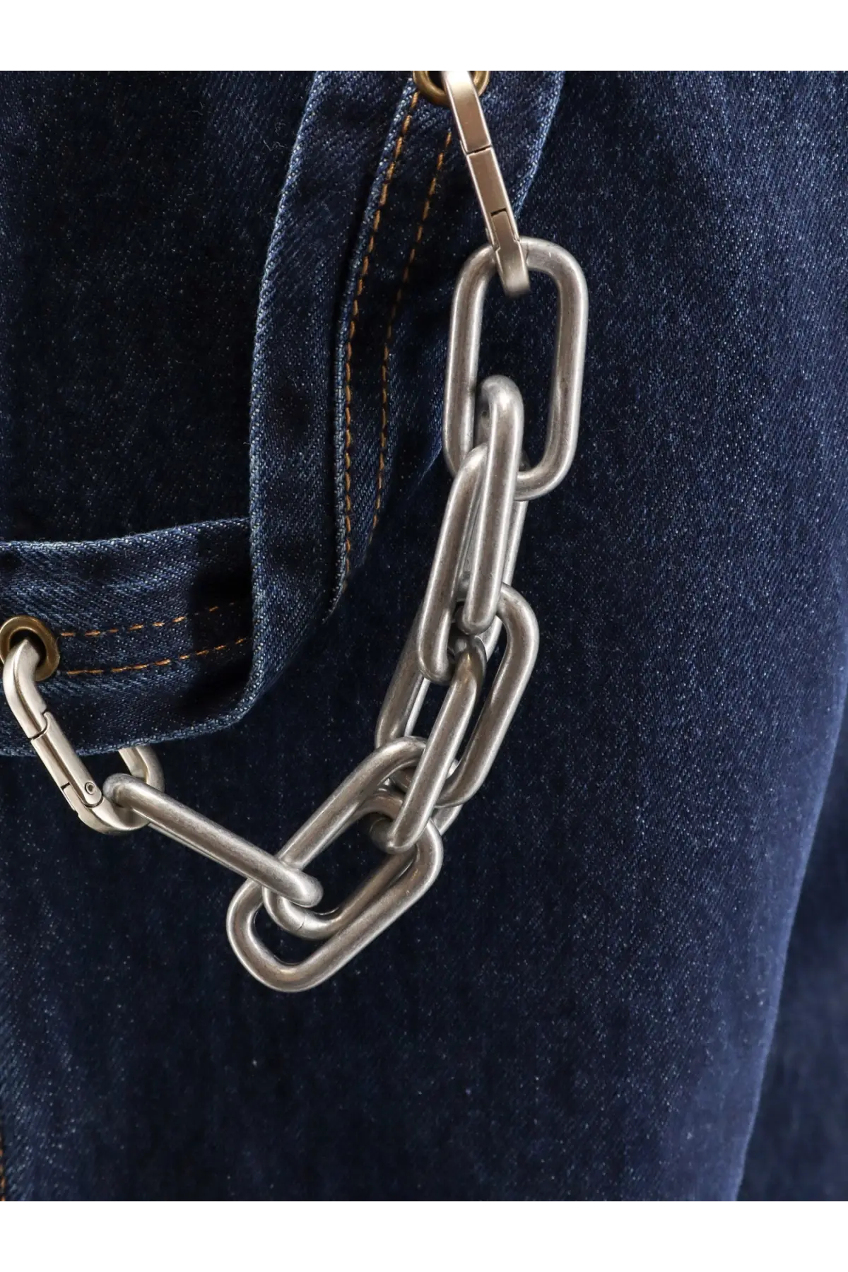 Silver-toned chunky link chain with sturdy metallic finish paired with darkpark men’s john jeans brown