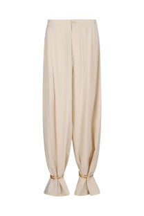 Darkpark women’s pants phebe white cream-colored wide-leg trousers with sleek flowing fabric and gold-toned ring cuffs