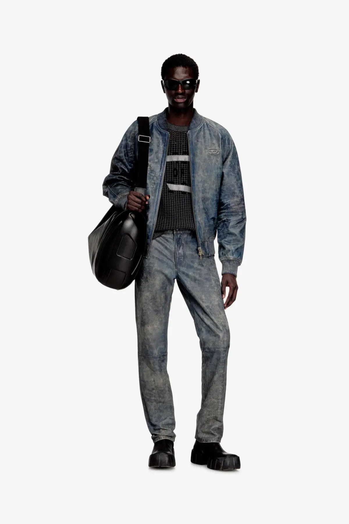 A black leather shoulder bag with quilted design and structured shape paired with diesel men’s cobb leather jacket grey