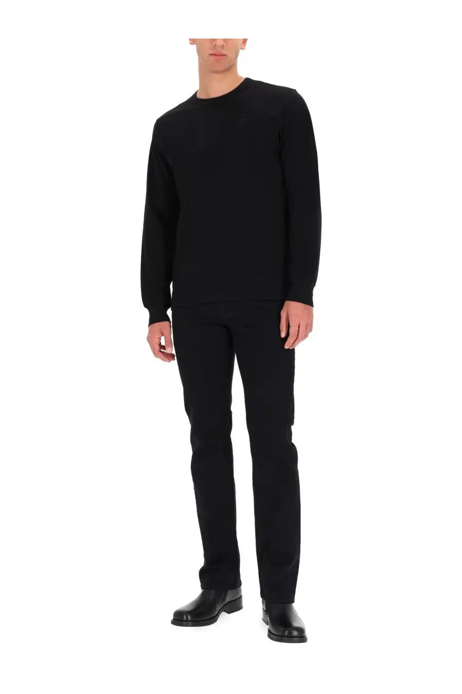 Diesel men’s jeans larkee black with a black long-sleeved crewneck sweater featuring smooth fitted knit texture