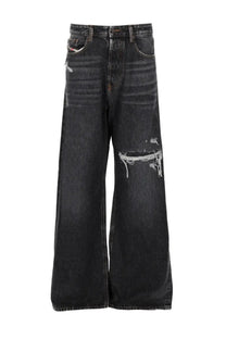 Diesel men’s black distressed denim jeans with wide-leg cut and frayed ripped details in a rise fit