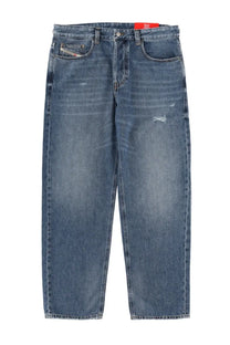 Diesel men’s Macs jeans in blue denim with faded wash and subtle distressing featuring Diesel logo on front pocket