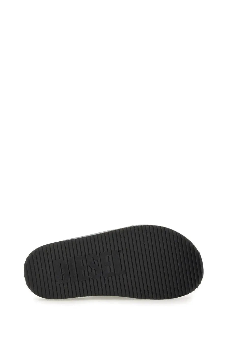 Black rubber sole with textured grip and embossed diesel logo on the back of diesel unisex slide sandal cris cros blue