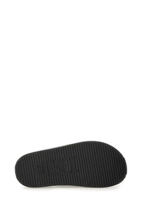 Black rubber sole with textured grip and embossed diesel logo on the back of diesel unisex slide sandal cris cros blue