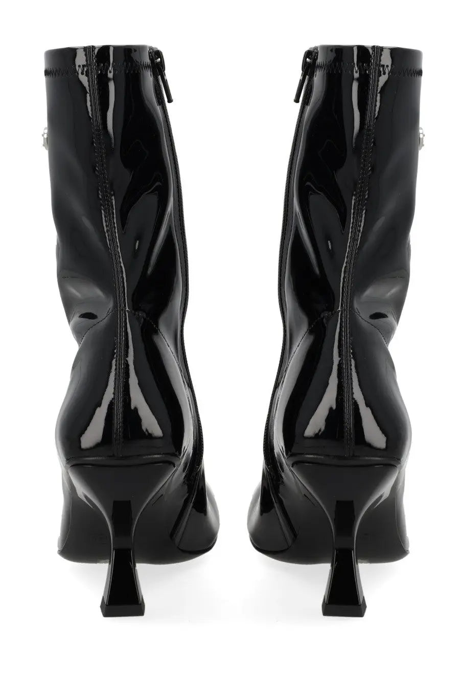 Diesel women’s black patent leather ankle boots with glossy finish and distinctive angular heels