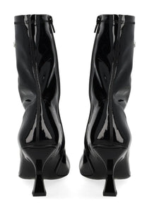 Diesel women’s black patent leather ankle boots with glossy finish and distinctive angular heels