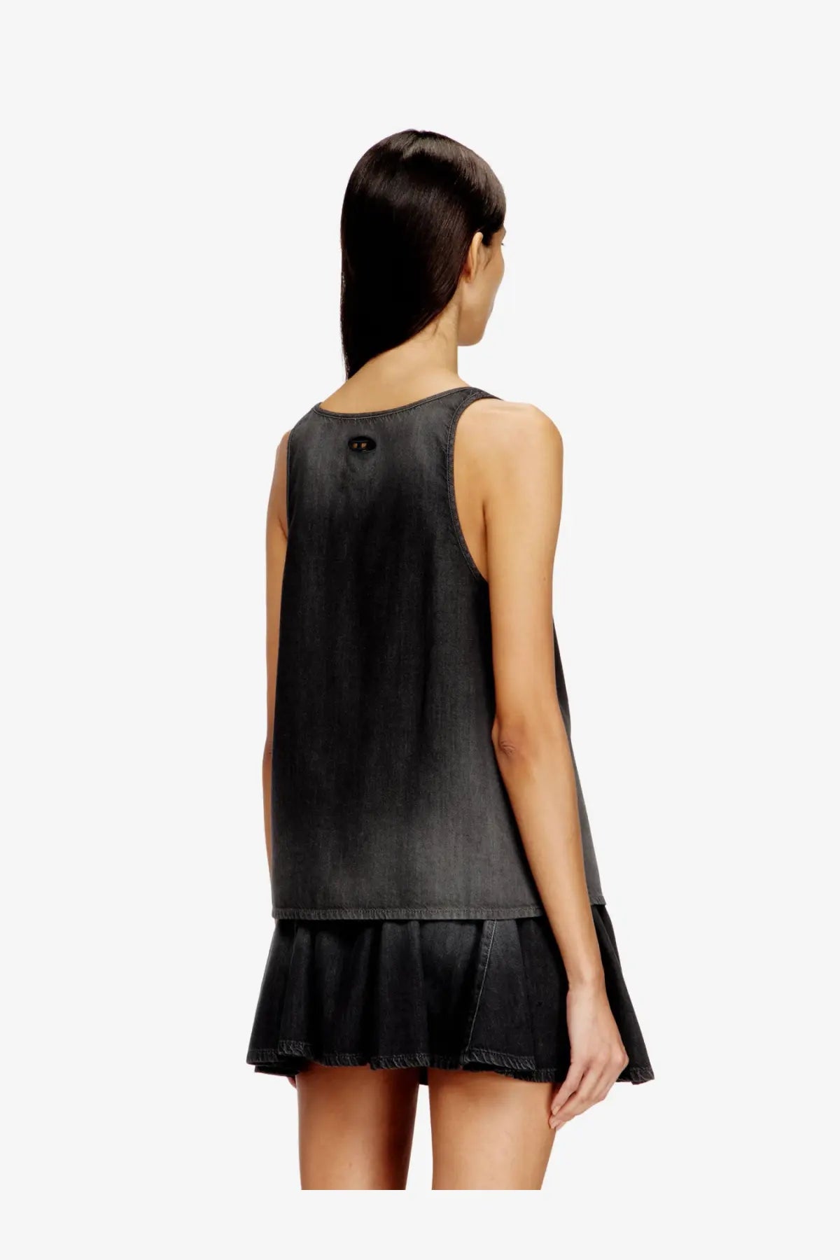 Diesel women’s black denim sleeveless tank top with flared hem and subtle distressing made from cotton and lyocell