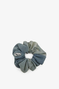 Diesel women’s denim bangle scrunchie hair tie in blue with denim texture and oval silver metal emblem