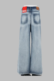 Light-wash denim wide-leg jeans for women with a red Diesel brand label at the waistband