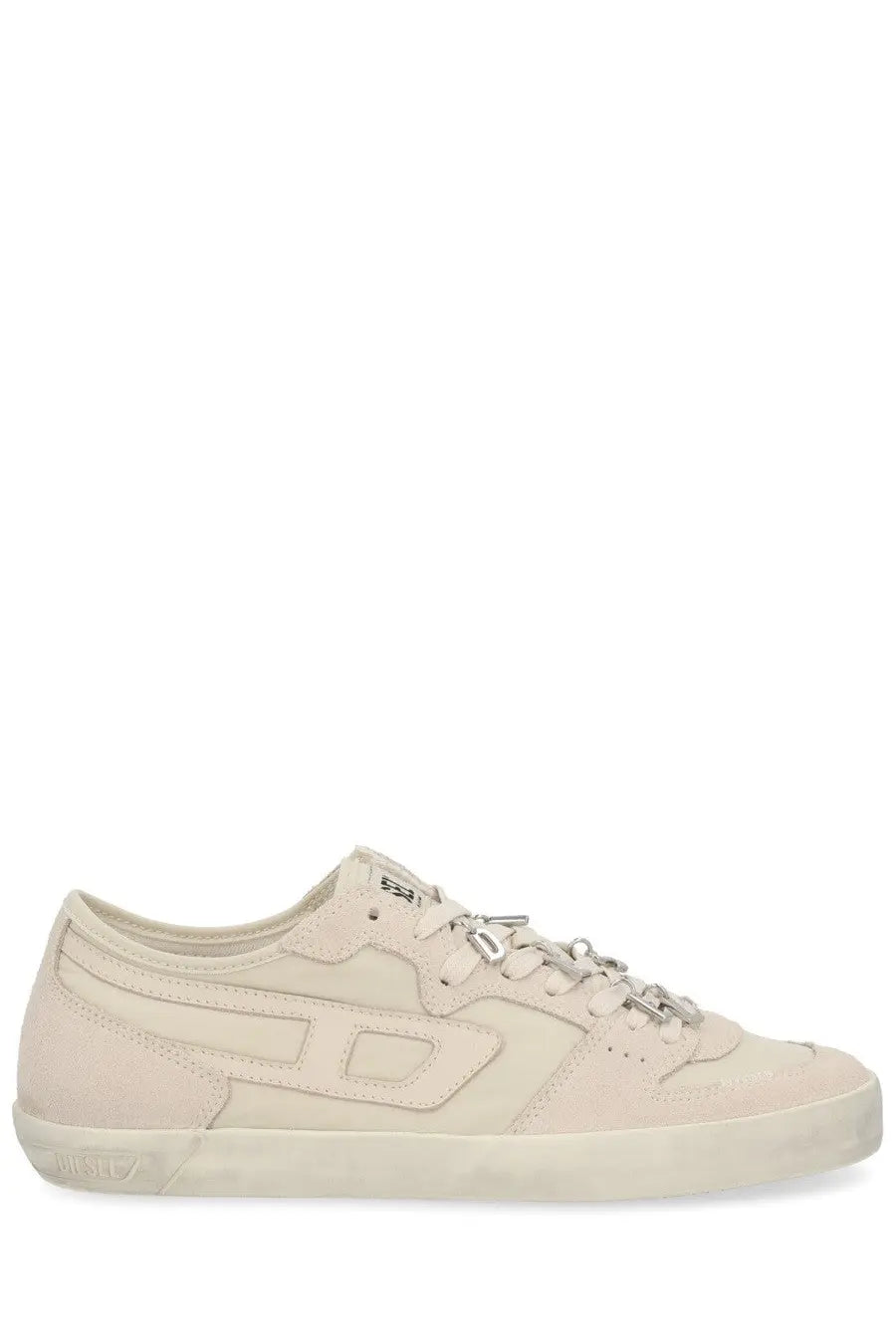 Cream-colored suede diesel women’s leroji low sneaker with minimalist design and metallic eyelets in white