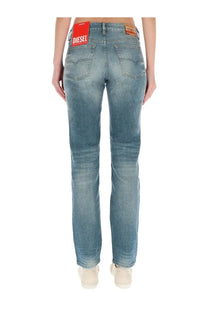 Back view of diesel women’s mine light-wash denim jeans with a classic straight-leg cut and brand label on the waistband