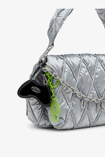 Silver quilted shoulder bag with shiny metallic finish and diesel women’s play charm shiny keychain black attached