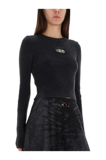 Diesel women’s black ribbed long sleeve shirt with circular anchor logo patch on the chest in cotton material