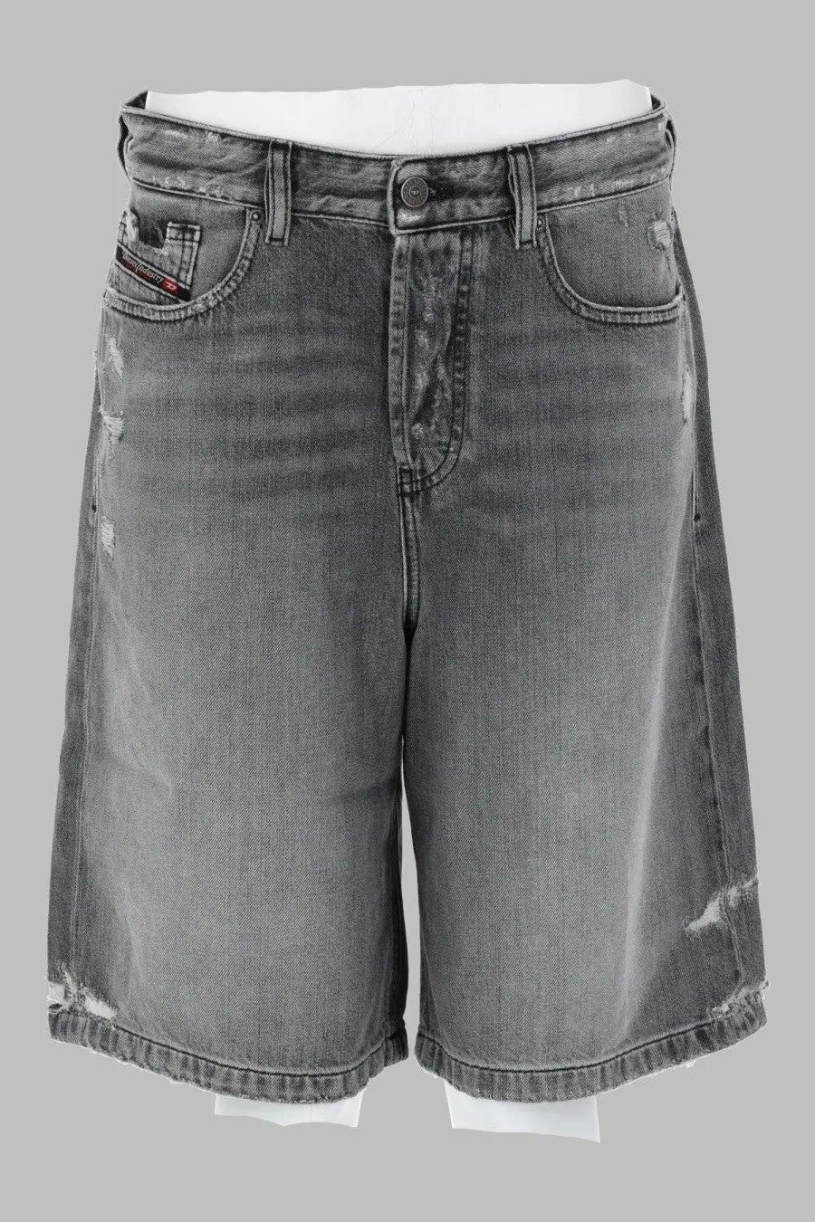 Diesel women’s shorts de sire in denim grey feature grey distressed denim with a faded wash and frayed hem