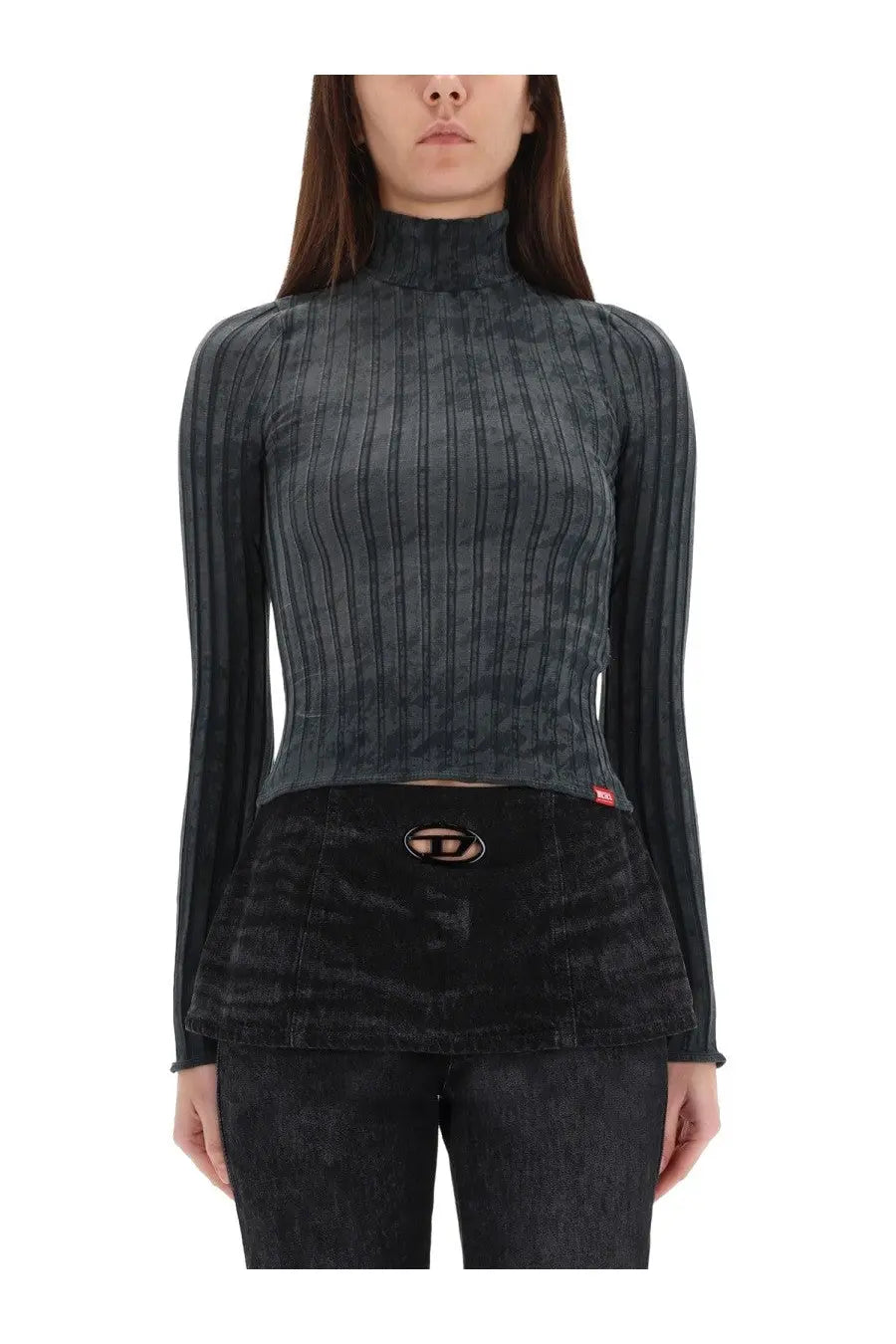 Diesel women’s black ribbed turtleneck top with distressed denim peplum skirt and red logo patch at waist