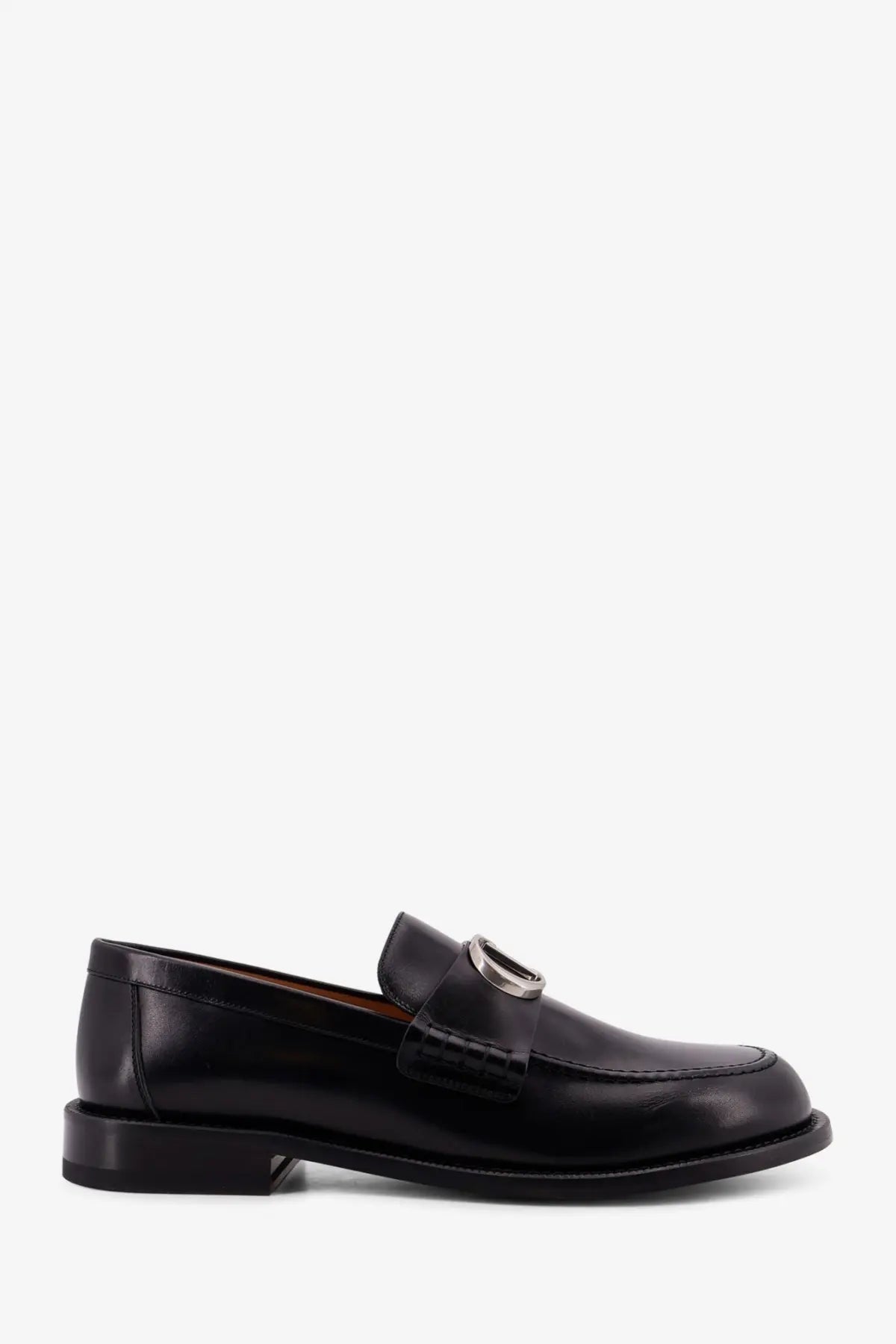 Dior men’s archie leather loafers in black featuring a silver-toned buckle detail on black leather