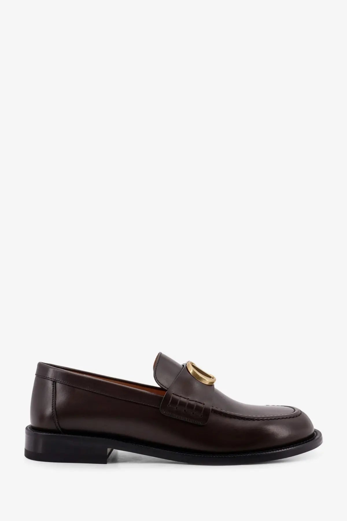 Brown leather Dior men’s Archie loafer with gold-tone circular buckle showcasing luxury and classic style