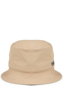 Beige canvas bucket hat with black embroidered Dior logo on the side from Dior men’s cappello bucket con beige
