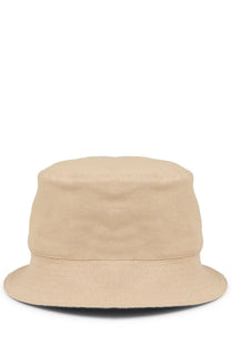Beige canvas bucket hat with wide brim and subtle stitching details from Dior men’s cappello bucket con beige collection