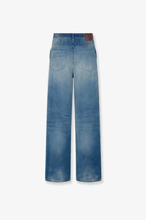 Back side of Dior men’s blue corduroy wide-leg trousers with faded wash and two back pockets
