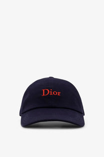 Navy blue dior men’s cotton baseball cap with red embroidered logo front view
