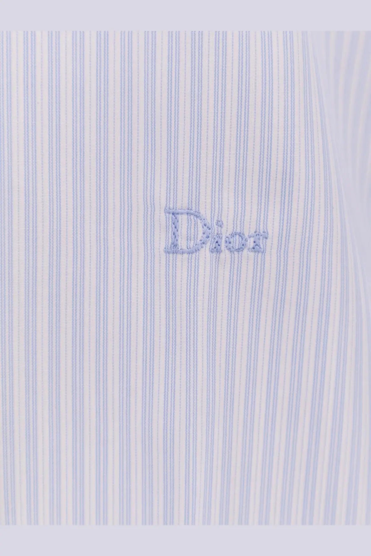 Dior men’s cotton shirt in light blue and white vertical stripes with embroidered logo on the front