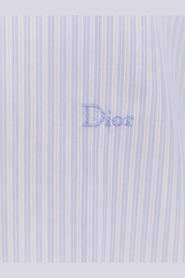 Dior men’s cotton shirt in light blue and white vertical stripes with embroidered logo on the front