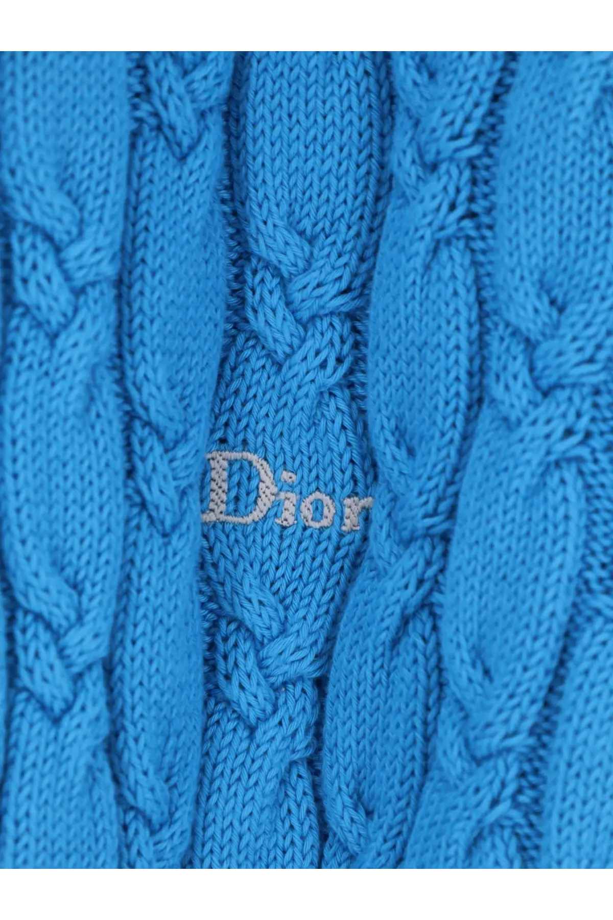 A vibrant blue dior men’s cotton cable-knit sweater with a subtle embroidered logo and textured design