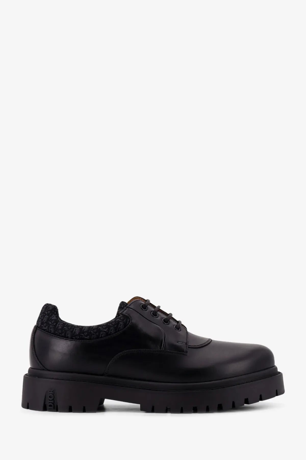 Dior men’s DH Dexpii black leather lace-up shoe with chunky rubber sole and textured knit heel detail back view