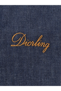 A navy blue denim jacket for men from Dior features golden thread embroidery spelling diorling on the back