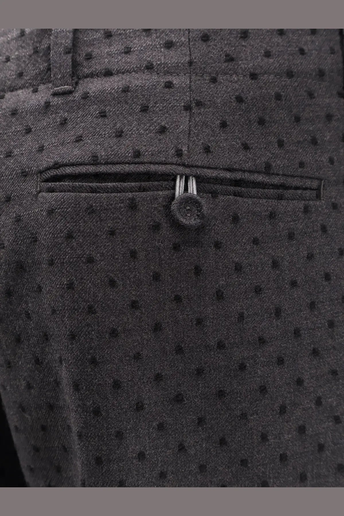 Dark gray dior men’s woolen trousers with black polka dots and silver-toned zipper pull made from virgin wool and alpaca jacquard