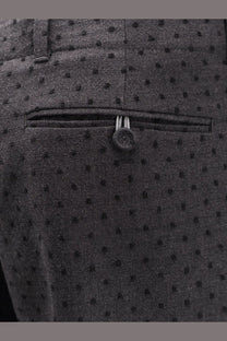 Dark gray dior men’s woolen trousers with black polka dots and silver-toned zipper pull made from virgin wool and alpaca jacquard