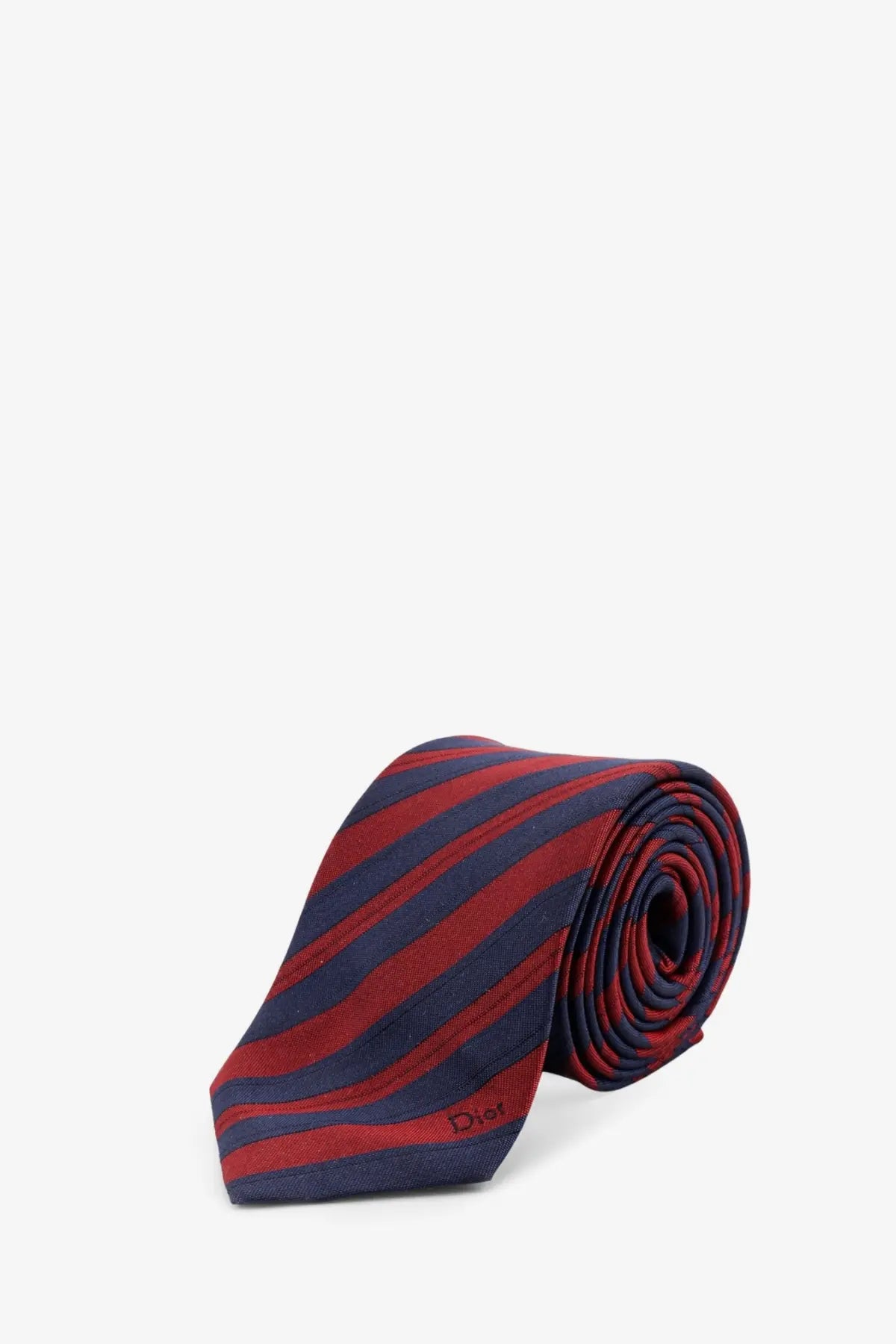 Dior men’s silk tie featuring bold diagonal stripes in rich red and deep navy blue