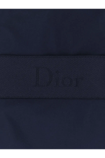 Dark blue dior logo strap with subtle woven texture on dior men’s sleeveless jacket blue back side