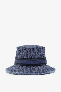Dior women’s Bobby Dior oblique cloche blue denim bucket hat with repeating logo pattern and black ribbon band