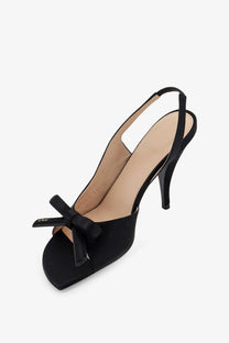 Black satin dior slingback pump with bow at the toe from Dior women’s bow satin sandals black collection