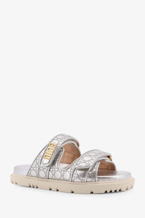 Silver metallic dior women’s dioract leather slide sandals with quilted straps and gold-tone branding in grey