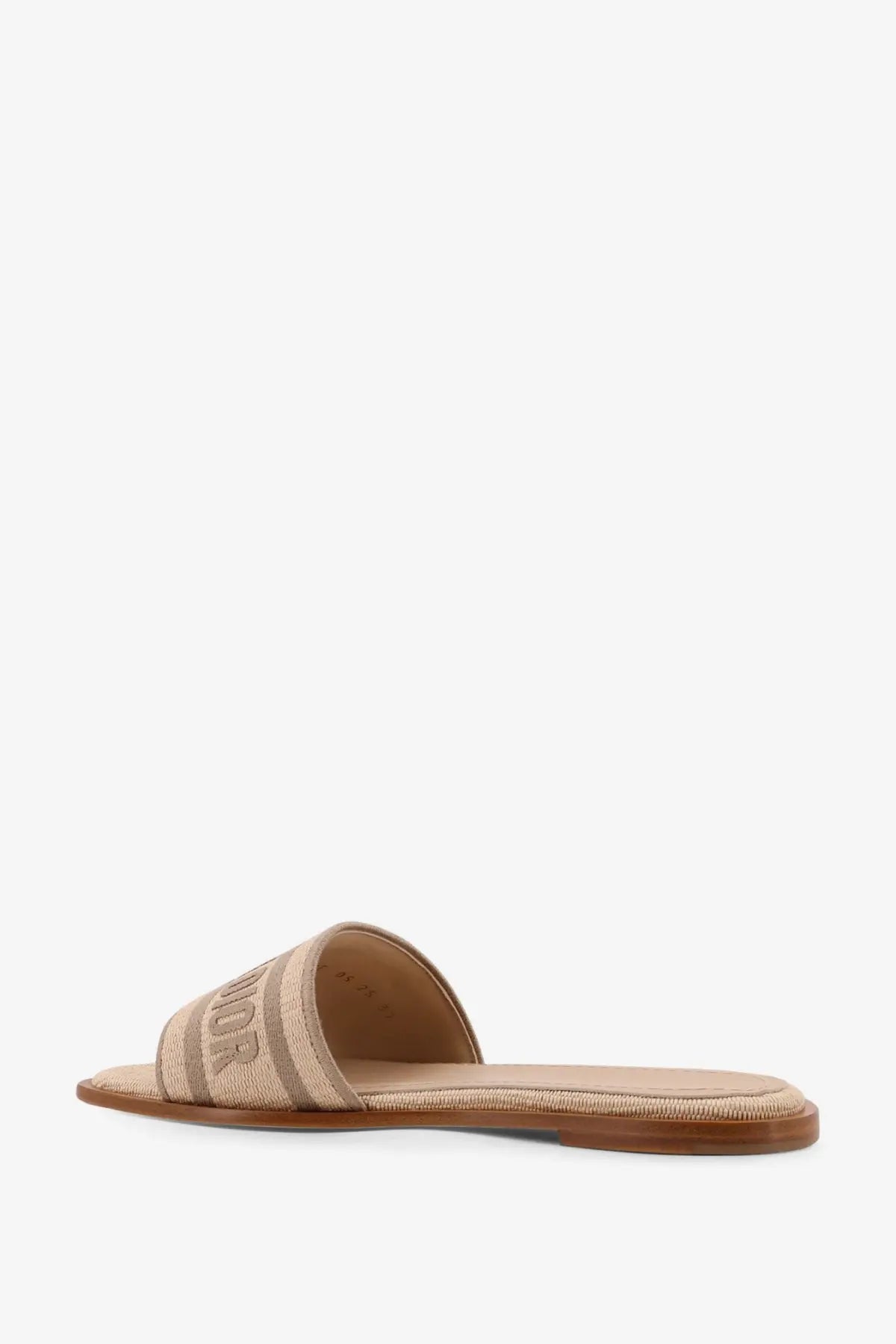 Beige canvas slide sandal with striped strap and subtle branding in dior womens dway dioriviera flat sandals brown