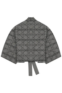Dior women’s giacca cannage grey cropped jacket with black and gray geometric pattern and tie-back detail back view