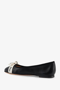 Dior women’s jadior black leather ballet flat with white ribbon bow and dior branding on the side